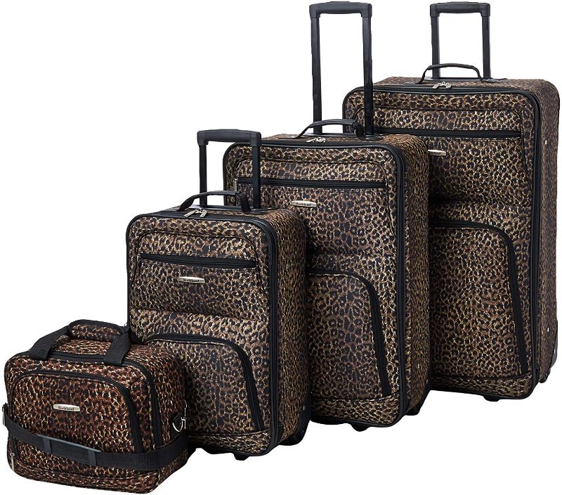 Photo 1 of **main suitcase has 2 large tears**

Rockland Jungle Softside Upright Luggage Set, Leopard, 4-Piece (14/29/24/28)
