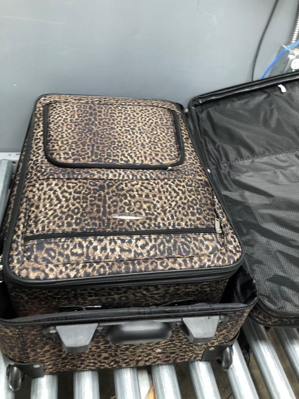 Photo 3 of **main suitcase has 2 large tears**

Rockland Jungle Softside Upright Luggage Set, Leopard, 4-Piece (14/29/24/28)
