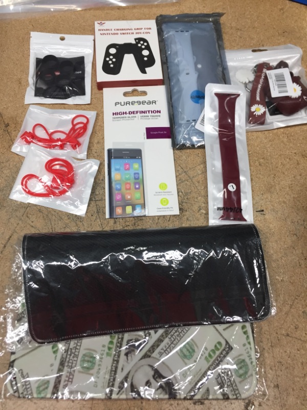 Photo 1 of BUNDLE OF ELECTRONIC ACCESSORIES 
\MOUSE PAD, WATCH BANDS, AIRPOD CASE 