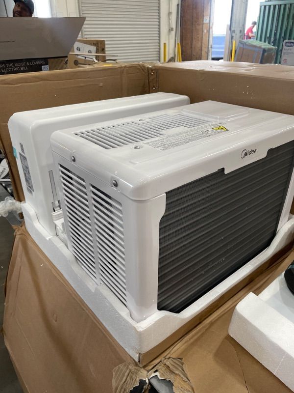 Photo 1 of Midea 8,000 BTU U-Shaped Smart Inverter Window Air Conditioner–Cools up to 350 Sq. Ft., Ultra Quiet with Open Window Flexibility, Works with Alexa/Google Assistant, 35% Energy Savings, Remote Control
