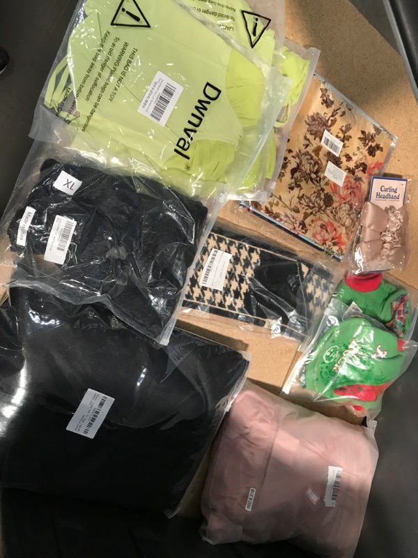 Photo 1 of Amazon Home, Assorted Clothing Bundle Womens Halter Top Dress 14, M/L Pants and Nightware , and Mens XL Pants with Silk Scarf Accessories, XXL Halloween Costume