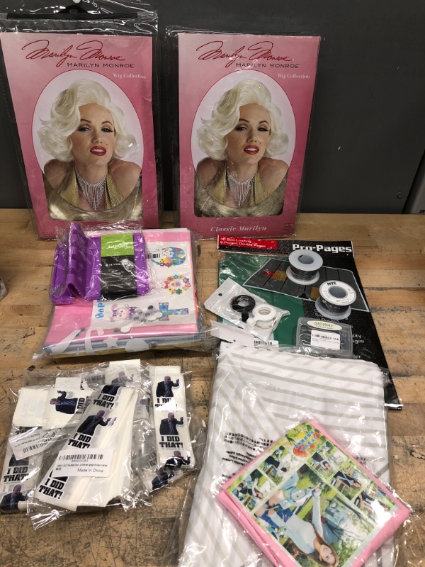 Photo 1 of **BUNDLE OF MARILYN MONROE WIGS/EASTER CRAFTS/SHOWER CURTAIN&HOLDERS/LADYS SHAWL/JELLY CELL HOLDER/BIDEN STICKERS/WIRE ROLLS**