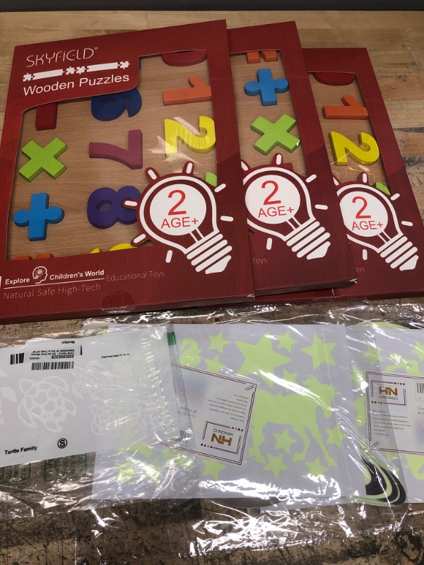 Photo 1 of **BUNDEL OF KIDS NUMBER PUZZLE AND GLOW IN THE DARK STICKERS**