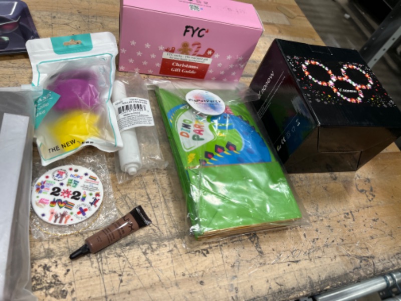 Photo 1 of **NONREFUNDABLE** AMAZON GOODS SOLD AS IS , LIGHT,SOCKS, ECT 