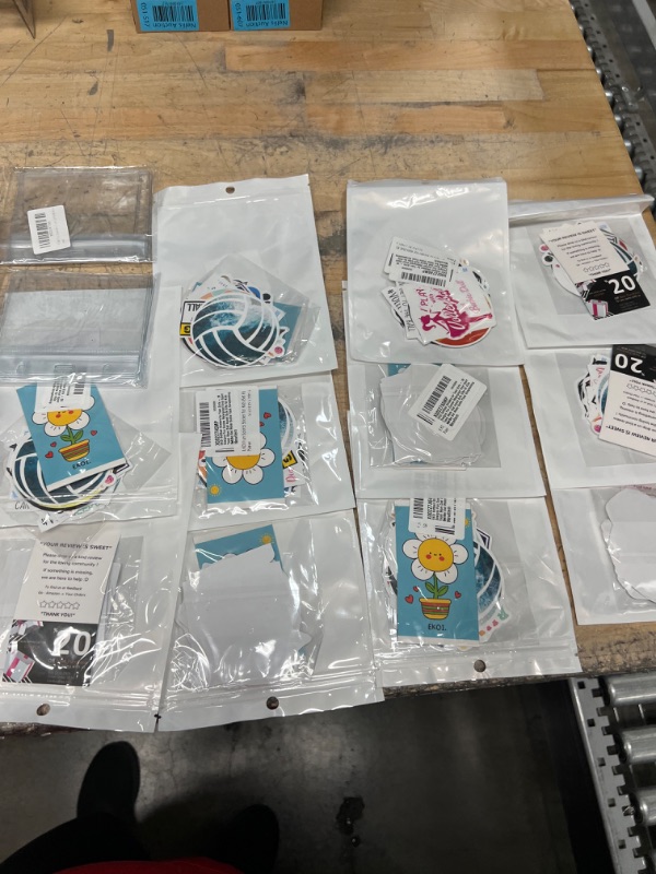 Photo 1 of **NONREFUNDABLE** AMAZON GOODS SOLD AS IS volleyball sticker, wine cups, number 1 ect