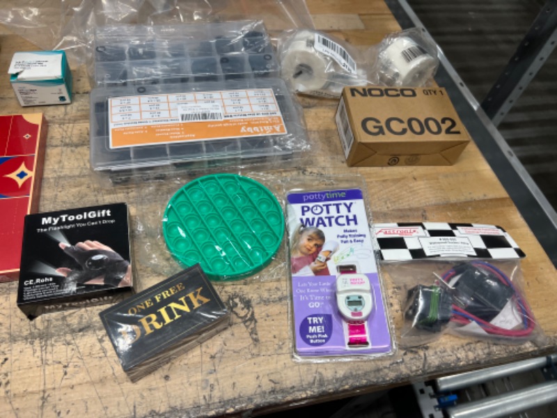 Photo 1 of **NONREFUNDABLE** AMAZON GOODS SOLD AS IS tulips, fidgets, baby, tools ect
