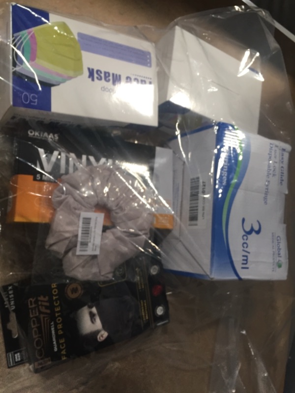 Photo 1 of ** AMAZON BUNDLE OF FACE MASK, DISPOSABLE SYRINGS AND HAIR TIE ** *** NON-REFUNDABLE ** ** SOLD AS IS**