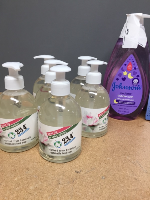 Photo 1 of ***non-refundable***
assorted bundle 
baby bed time bubble bath, 6 water lily scented hand soap, cat/dog food bowl with stand, Easter gnomes, pack of clear backer board, mini transformer toy 