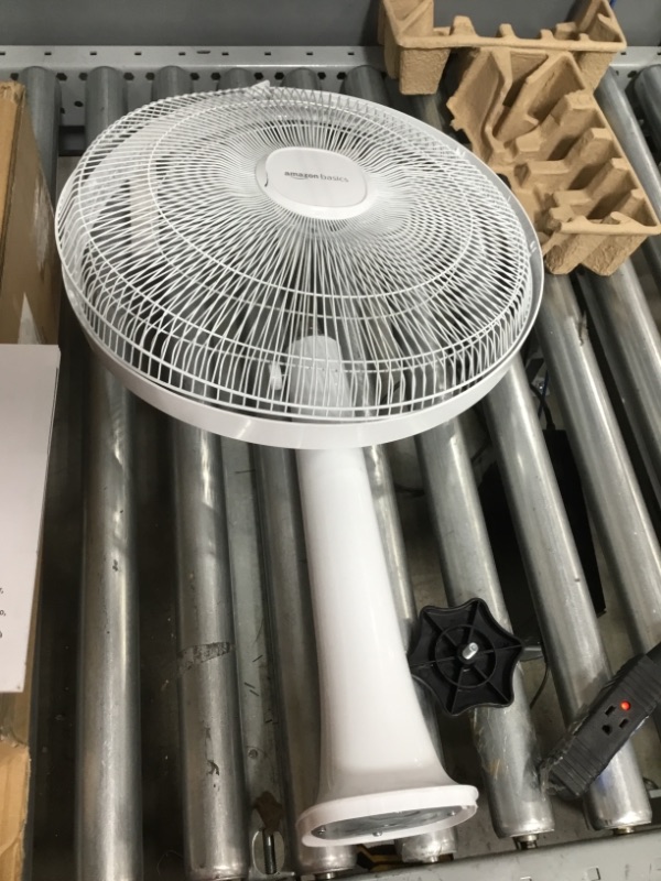 Photo 1 of Amazon Basics Oscillating Dual Blade Standing Pedestal Fan with Remote - Quiet DC Motor, 16-Inch **parts only **Nonfunctional
