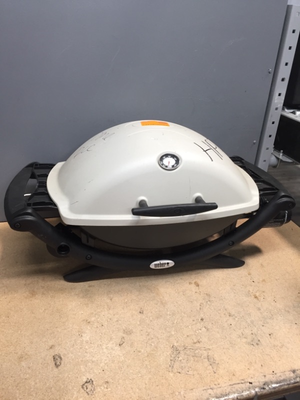 Photo 4 of  Weber Q1000 Liquid Propane Grill, Chrome
