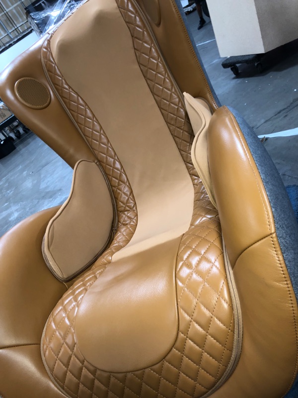 Photo 18 of NOUHAUS Heated Classic Massage Chair Full Body and Spot Massaging Recliner with Ottoman, Bluetooth Speaker, In-Chair Charger. Portable Shiatsu Body Massager Chair (Caramel, Leather)
