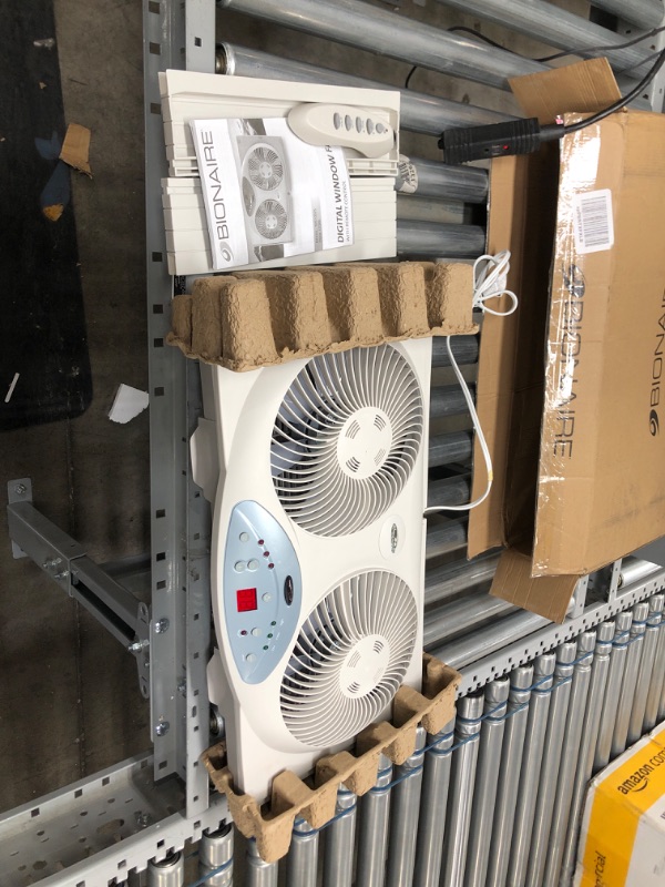 Photo 2 of **nonfunctional** Bionaire Window Fan with Twin 8.5-Inch Reversible Airflow Blades and Remote Control, White
