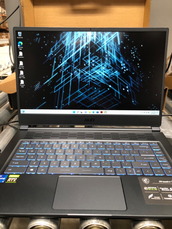 Photo 2 of MSI Stealth 15M Gaming Laptop: 15.6" 144Hz FHD 1080p Display, Intel Core i7-11375H, NVIDIA GeForce RTX 3060, 16GB, 512GB SSD, Thunderbolt 4, WiFi 6, Win10, Carbon Gray (A11UEK-009)
