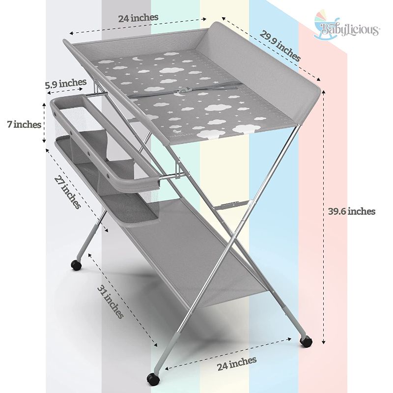 Photo 1 of Babylicious Baby Portable Changing Table - Foldable Changing Table with Wheels - Portable Diaper Changing Station - Adjustable Height Baby Changing Table-Safety Belt and Large Storage Rack for Infants
