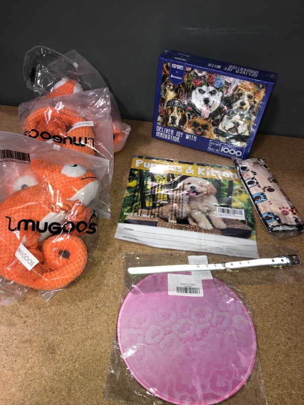 Photo 1 of **BUNDLE OF MIXED ITEMS-DOG TOYS/CAT COLLER/MOUSE PAD/CALENDAR/KIDS FACE MASK/DOG PUZZLE**