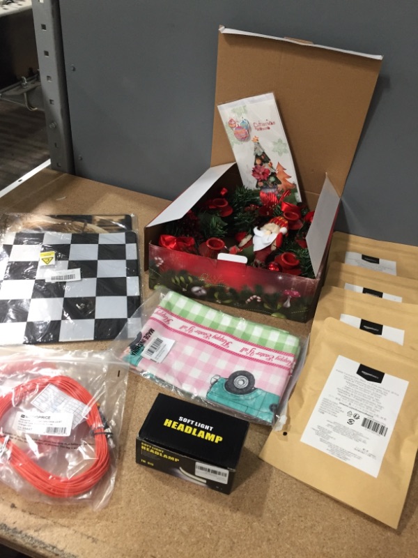 Photo 1 of **BUNDLE OF MIXED ITEMS-RUBBER FURNITURE PADS/EASTER TABLE RUNNER/HEADLAMP/MONOPRICE OM1 FIBER OPTIC CABLE/MOUSE PADS/XMAS CANDLE HOLDER**