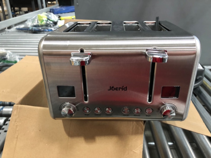 Photo 3 of **PARTS ONLY**
Joerid 4 Slice Toaster,9 Bread Shade Setting,Safe Stainless Steel,Useful Bagel/Defrost/Cancel Function with Dual Control Panels,4 Extra Wide Slots,Removable Crumb Tray,Suitable for Various Bread Type
RIGHT SIDE OF TOASTER IS DAMAGED 