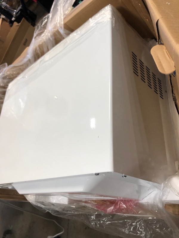 Photo 8 of GE 2.0 cu. ft. Countertop Microwave in White