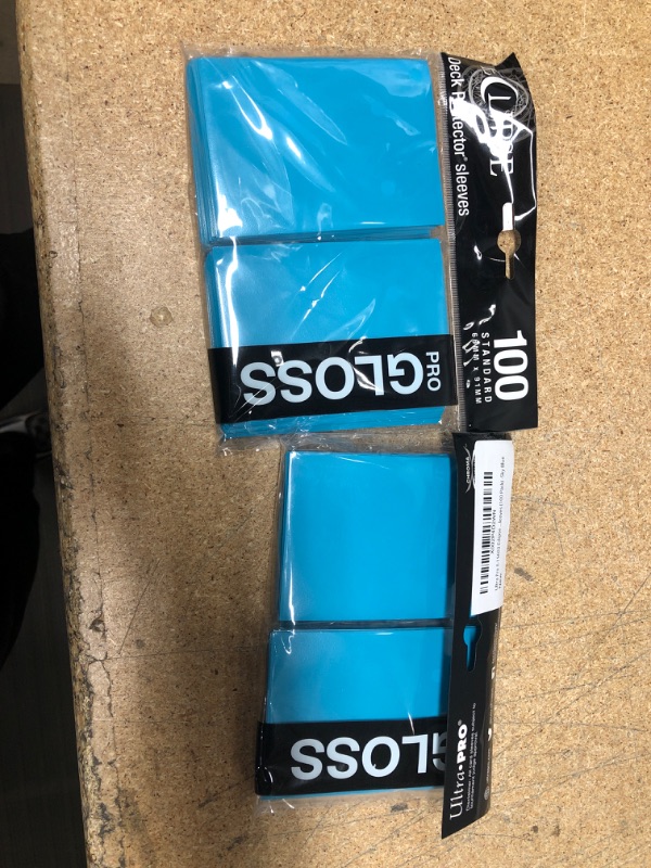 Photo 2 of ** SETS OF 2**
Ultra Pro E-15603 Eclipse Gloss Standard Sleeves (100 Pack) -Sky Blue
