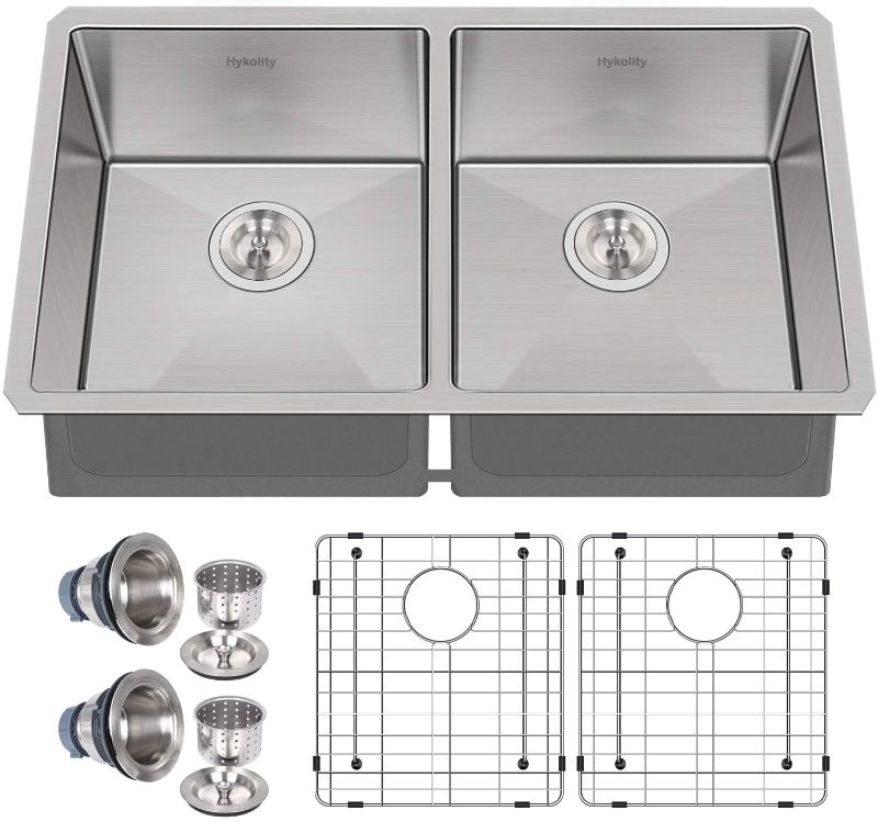 Photo 1 of ***STOCK PHOTO FOR REFERNECE ONLY***
33" X 19" X 8" Double Bowl Kitchen Sink Drop In WITH drain assembly
rollup rack
sink grate AND PLUMBING 
