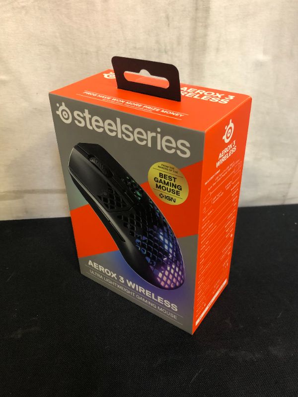 Photo 2 of SteelSeries Aerox 3 Wireless - Super Light Gaming Mouse - 18,000 CPI TrueMove Air Optical Sensor - Ultra-lightweight Water Resistant Design - 200 Hour Battery Life
