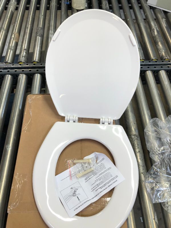 Photo 3 of Centoco Round Anti-Microbial Wood Core Toilet Seat White

