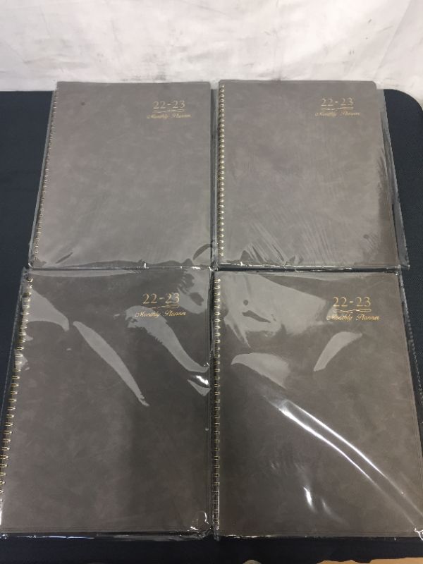 Photo 1 of 2022-2023 Monthly Planner - Planner 2022 from January 2022 - December 2023 Covering 2 Years, with Tabs & Pocket & Label, 9" x 11", Contacts and Passwords + Two-Sided Back Pocket + Premium Thick Paper---SET OF 4---
