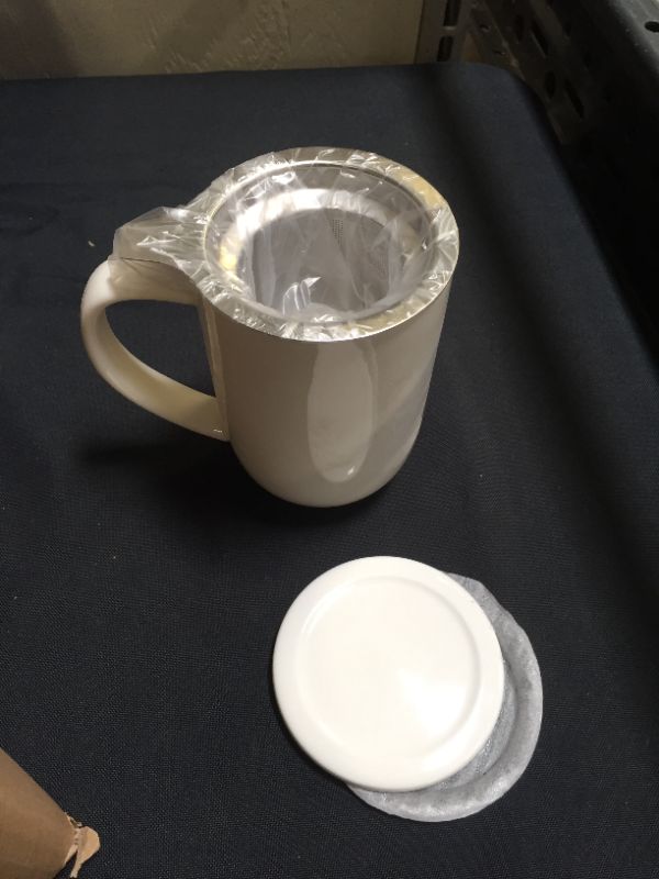 Photo 2 of  AVLA Porcelain Tea Mug with Infuser and Lid, 18 OZ Ceramic Large Tea Strainer Cup with Tea Bag Holder, Tea Steeping Mug for Loose Leaf, Coffee, Milk, Teacup with Filter, Easy to Hold, White
