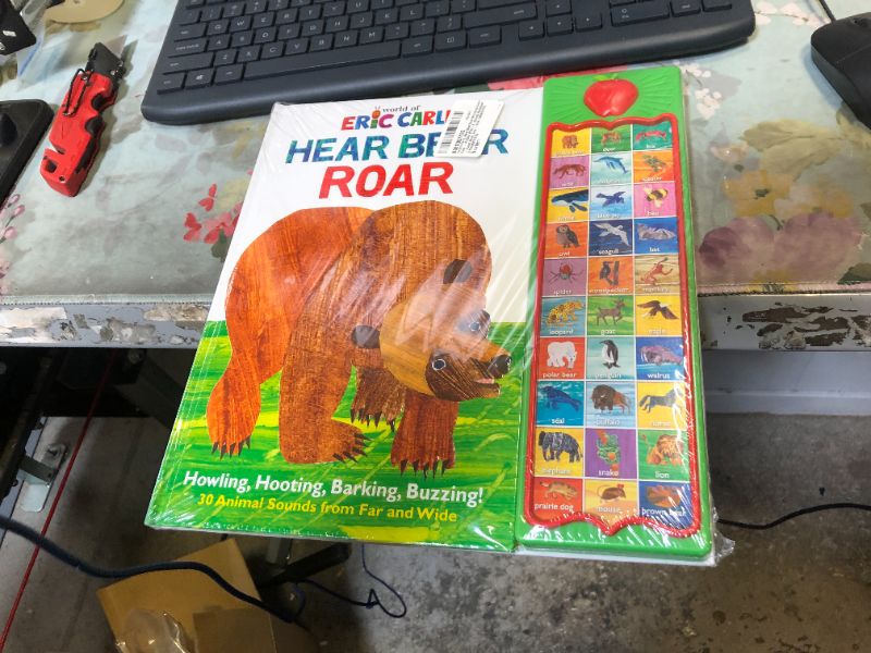 Photo 2 of World of Eric Carle, Hear Bear Roar 30-Button Animal Sound Book - Great for First Words - PI Kids Hardcover – Sound Book, July 1, 2014
by Editors of Phoenix International Publications (Author, Editor), Eric Carle