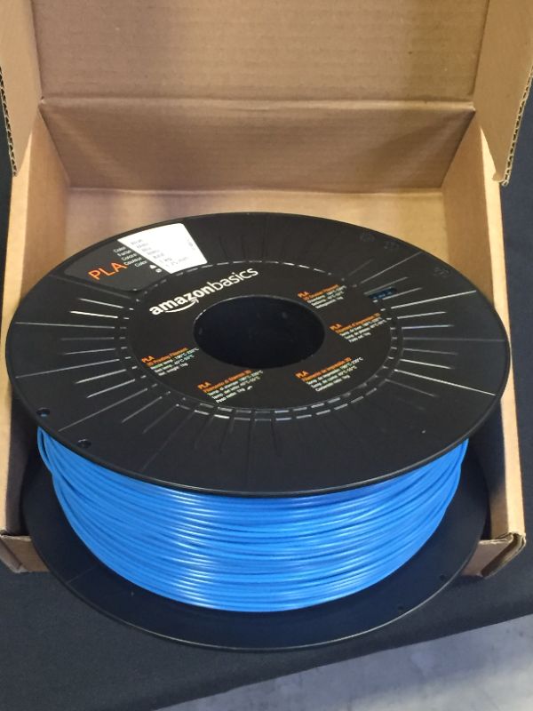 Photo 2 of Amazon Basics PLA 3D Printer Filament, 1.75mm, Blue, 1 kg Spool
