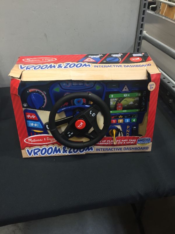 Photo 2 of Melissa & Doug Vroom & Zoom Interactive Wooden Dashboard Steering Wheel Pretend Play Driving Toy (BATTERIES NOT INCLUDED)
