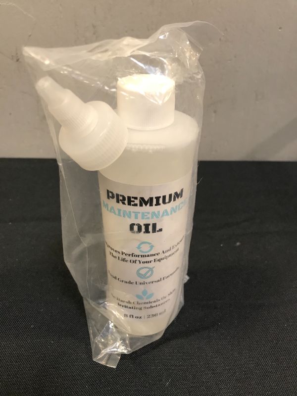 Photo 2 of (8oz) Premium Lubricating White Oil for Hair Clippers Electric Shaver Oil Lubricant, Hair Clipper Blade Oil, Hair Clipper Oil, Beard Trimmer Oil, and Straight Razor Lubricant with Anti-Rust Protection
