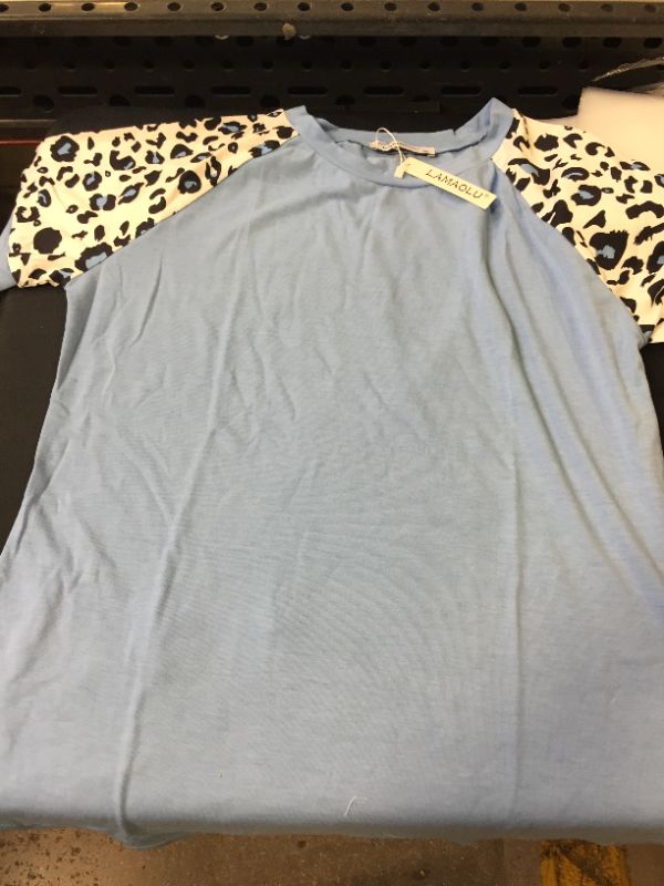 Photo 1 of women's shirt
size M