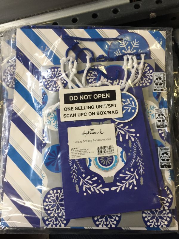 Photo 2 of Hallmark Holiday Gift Bag Assortment, Blue and Silver (Pack of 8 Gift Bags; 3 Small 6", 3 Medium 9", 2 Large 13") Ornaments, Snowflakes, Stripes
