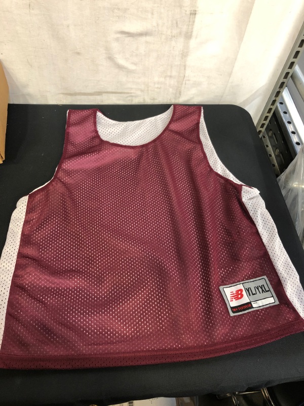 Photo 1 of KID'S NEW BALANCE REVERIBLE JERSEYS, SIZE L/XL 