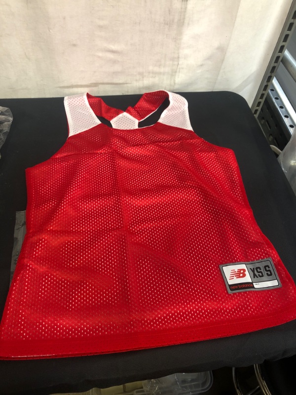 Photo 1 of CHILDREN'S NEW BALANCE REVERSIBLE JERSEY, SIZE XS/S