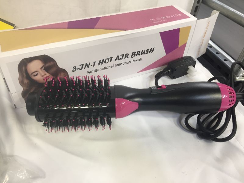 Photo 1 of   Electric Hair Brush 