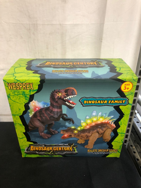 Photo 2 of 2 Pack Electronic Walking Dinosaur Toy with LED Light Up Eyes, Roaring Sound, Realistic Spinosaurus and Stegosaurus, Dinosaur Party Favors, Dinosaur Toy for Kids Boys Girls Ages 3 4 5 6 7 Year Old
