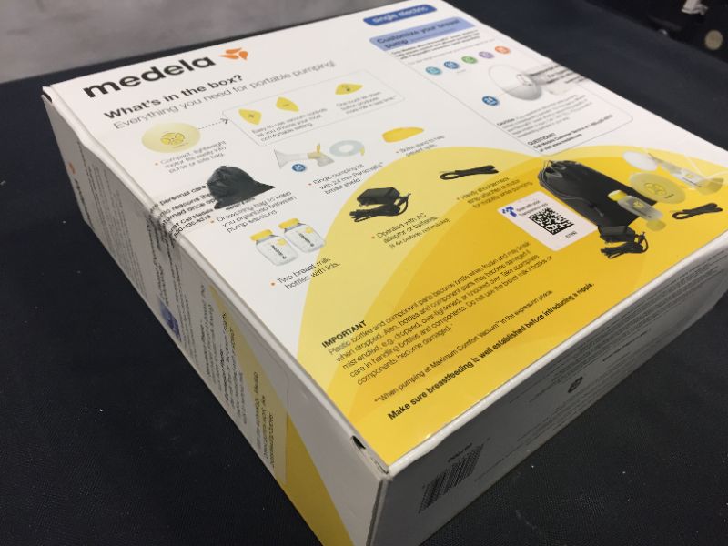 Photo 2 of Medela, Swing, Single Electric Breast Pump, Compact and Lightweight Motor, 2-Phase Expression Technology, Convenient AC Adaptor or Battery Power, Single Pumping Kit, Easy to Use Vacuum Control
