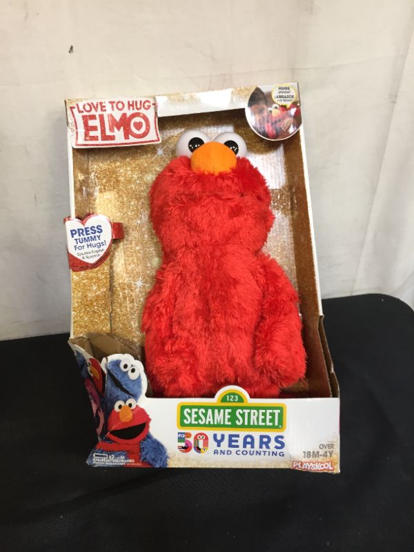 Photo 2 of Sesame Street Love to Hug Elmo Talking, Singing, Hugging 14" Plush Toy for Toddlers, Kids 18 Months & Up
