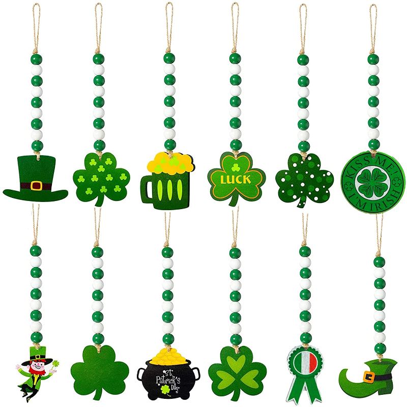 Photo 1 of 12 Pieces St Patrick's Day Wood Bead Garlands Green Shamrock Hanging Wooden Ornament Rustic Farmhouse Beads Pendants with Rope for St Patrick's Day Tree Table Decoration
