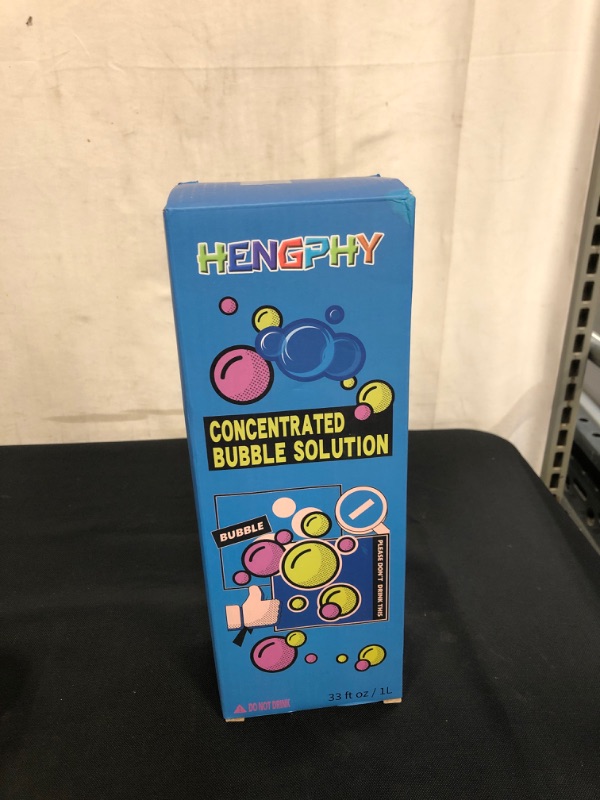 Photo 2 of HENGPHY Bubble Solution Concentrate, 33 oz (Up to 2.5 Gallon) Giant Bubbles Mix Refills Non Toxic with Leak-Proof Design Bubble Liquid
