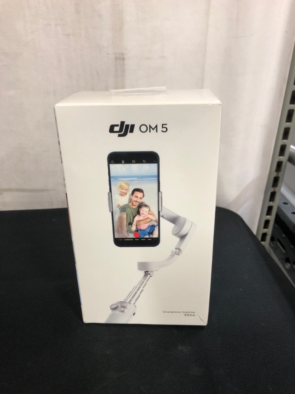 Photo 2 of DJI OM 5 Smartphone Gimbal Stabilizer, 3-Axis Phone Gimbal, Built-In Extension Rod, Portable and Foldable, Android and iPhone Gimbal with ShotGuides, Vlogging Stabilizer, YouTube TikTok Video, Gray
