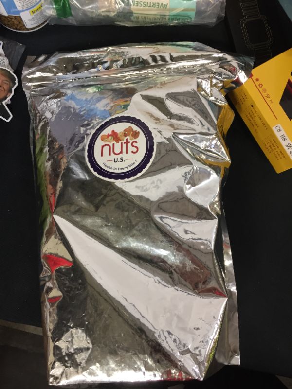 Photo 1 of 4 LB bag of assorted nuts 