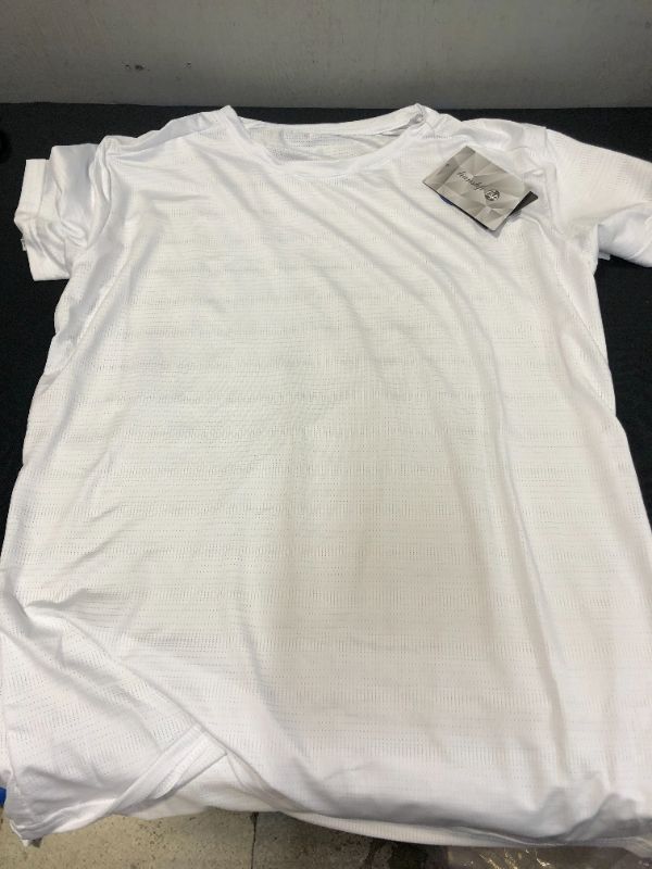 Photo 1 of WOMEN'S ATHLETIC SHIRT SIZE L 

