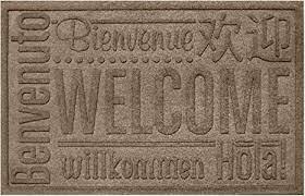 Photo 1 of 2X3 BLACK WELCOME MAT. MULTIPLE LANGUAGES ITEM IS BLACK SEE OTHER PHOTO