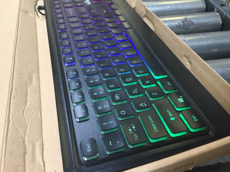 Photo 3 of Fiodio Rainbow Membrane Gaming Keyboard, Quiet Wired Computer Keyboard, 104 Silent Keys, 26 Anti-Ghosting Keys, Spill Resistant, Multimedia Control for PC and Desktop
