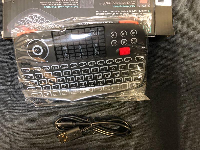 Photo 2 of Rii Rk707 Mini Wireless Game Controller Mouse Keyboard Combo
