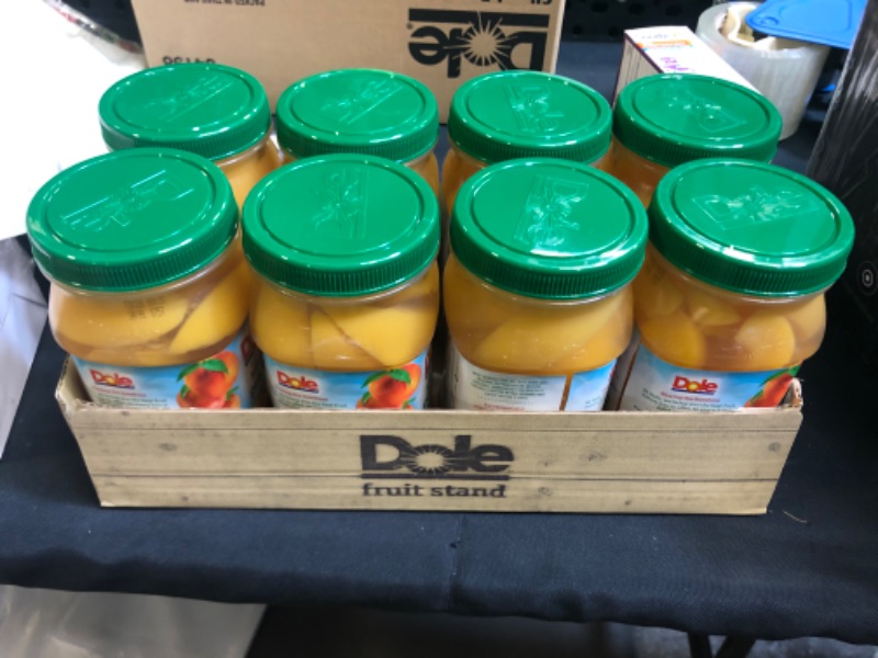 Photo 2 of Dole Yellow Cling Sliced Peaches in 100% Fruit Juice, 23.5 Oz Resealable Jars, 8 Count -- Best Before NOV 13 2021