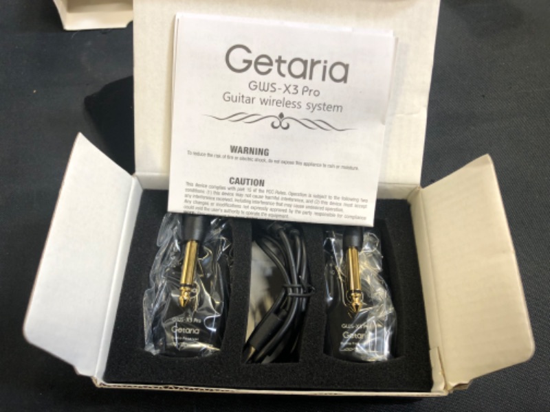 Photo 2 of Pro Wireless Guitar Transmitter Receiver, Getaria Wireless Guitar System Replace Electric Bass Guitar Cable to Guitar Amplifier Adapter Pedals
